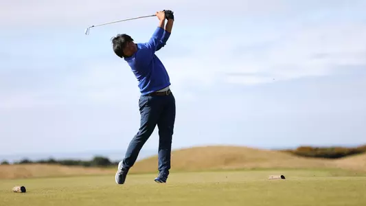 Wenliang Xie tees off during a practice round at the Bandon Dunes Championship