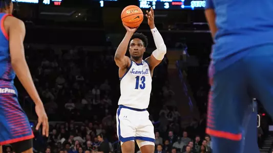 KC Ndefo shoots a three pointer in the BIG EAST Tournament