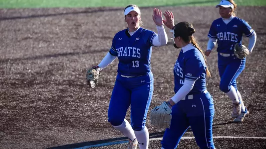 Olivia Gilbert and Kyra Kreuscher High-Five