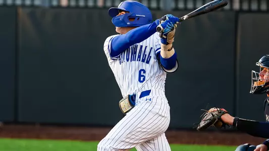 Max Viera takes a swing during Seton Hall's game against Monmouth.