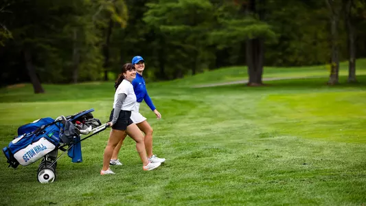 Ginevra Zavagli and Ludovica Busetto walk together during a practice round in the fall of 2022