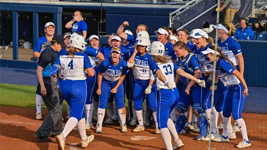Kelsey Carr crossing plate after BIG EAST Tourney Homer