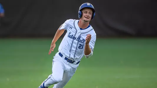 Devin Hack rounds second base against Creighton