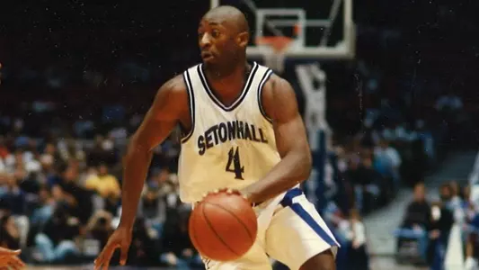 Adrian Griffin dribbling the ball against Rutgers