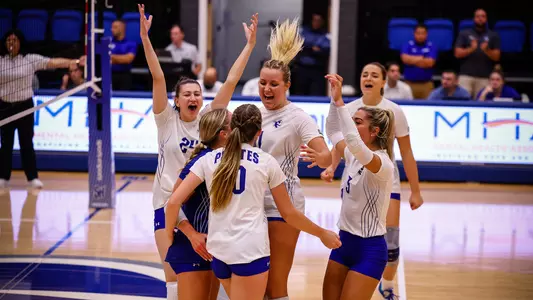 Seton Hall volleyball team celebrates after a point during a match during the 2022 season.
