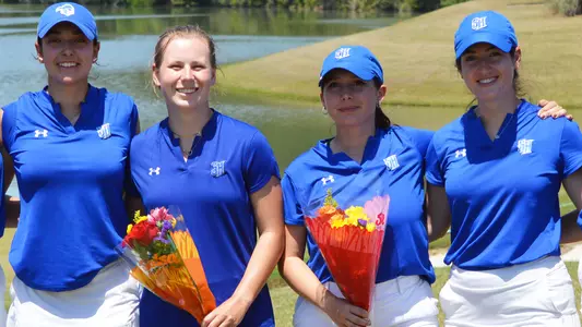 Members of the Seton Hall women's golf team pose after round three of the BIG EAST Championship.