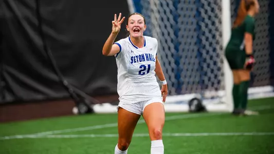 Natalie Tavana celebrates her hat trick against Binghamton.