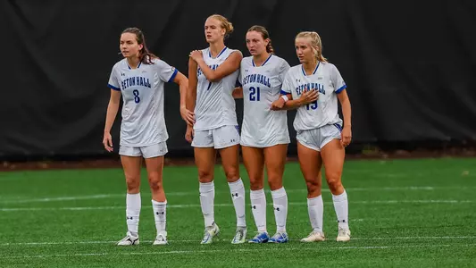 Seton Hall women's soccer players line up to defend a free kick