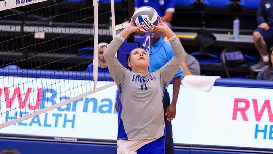 Maddie Klungel puts up a set for the Pirates against NJIT on Aug. 31.