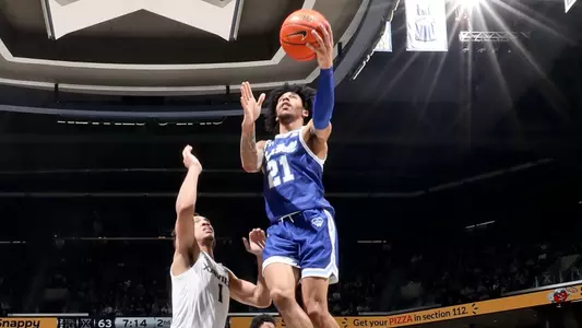 Isaiah Coleman goes up for a layup at Xavier