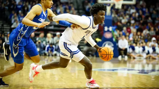 Kadary Richmond drives to the bucket against Creighton