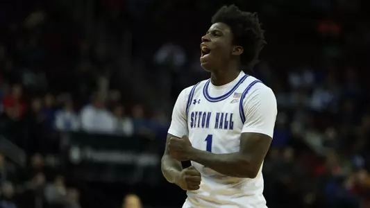 Kadary Richmond celebrates a basket against St. John's