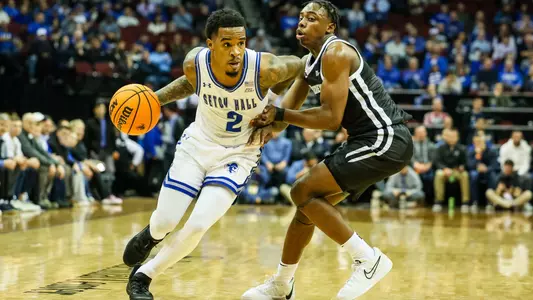 Al-Amir Dawes drives to the basket against Providence