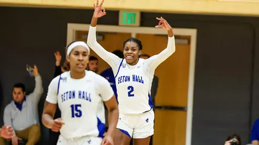 I'yanna Lops celebrates a three-pointer against St. John's on Jan. 22
