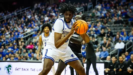 Jaden Bediako comes down with a rebound against Providence at Prudential Center