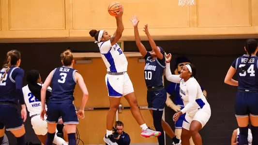 Azana Baines grabs a rebound against Villanova on Jan. 3