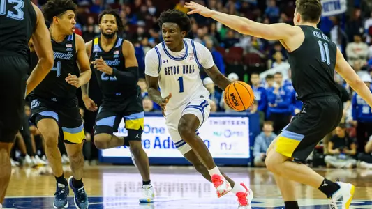 Kadary Richmond drives through the lane against Marquette.