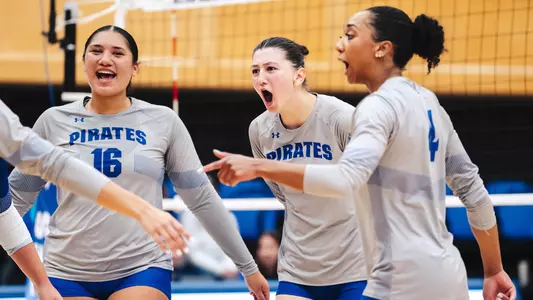 The Seton Hall volleyball team celebrates a point against Sacred Heart on Sept. 6