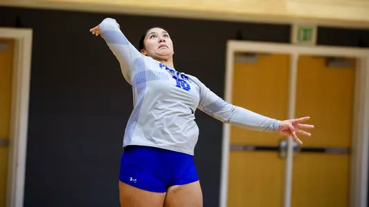 Senna Roberts-Navarro serves during her match against DePaul on Oct. 13.