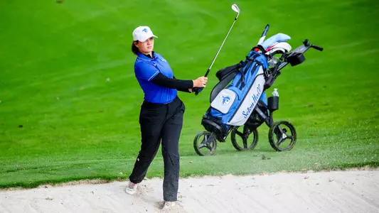 Amelie Gras shoots from the bunker during a practice round in the fall of 2024