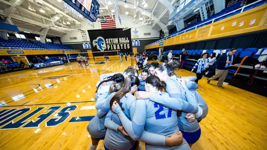 The Seton Hall volleyball team huddles before its match against Georgetown on Oct. 16