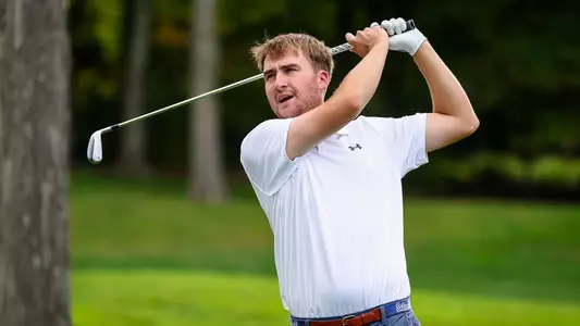 George Fricker takes a swing during a practice round during the fall of 2024.