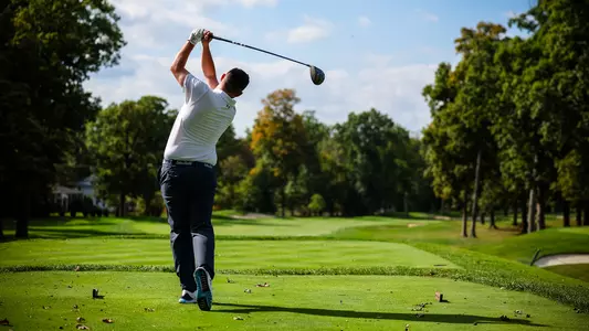 Angus O'Brien tees off during a practice round in the fall of 2024.