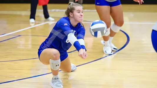 Hadlee Ackerman digs out the volleyball against Georgetown on Oct. 16