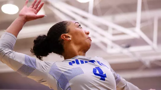 Perri Lucas rises to hit the volleyball against Sacred Heart on Sept. 6