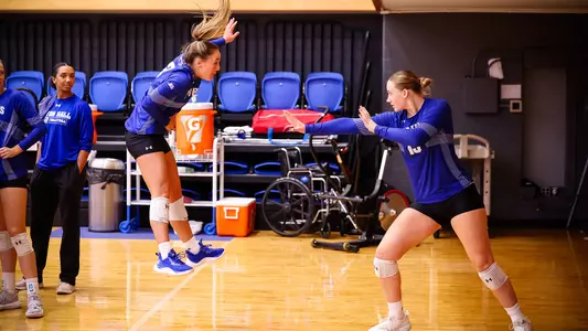 Faith LaMacchia and Maddy Loiselle gear up for Seton Hall's match against Kent State on Sept. 8