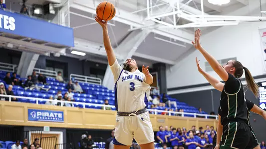 Faith Masonius drives the the hoop against Wagner on Nov. 7