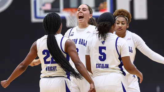 Seton Hall women's basketball team celebrates after scoring a basket against Wagner on Nov. 7