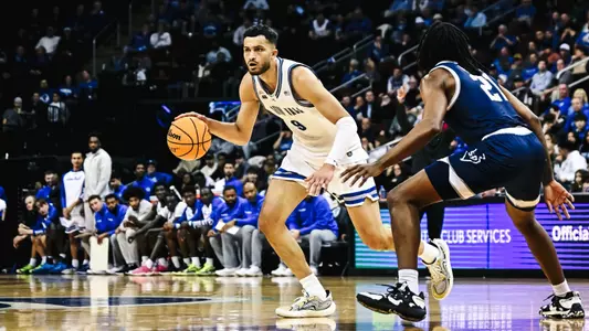 Yacine Toumi takes a dribble against Saint Peter's at Prudential Centerr
