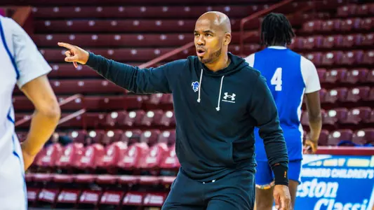 Head coach Shaheen Holloway coaches at a practice before the Charleston Classic