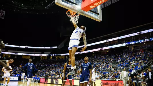Chaunce Jenkins rises for a slam dunk against Wagner on Nov. 4.