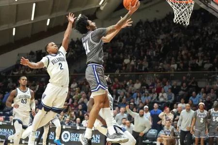 Isaiah Coleman Driving to Basket Against Villanova