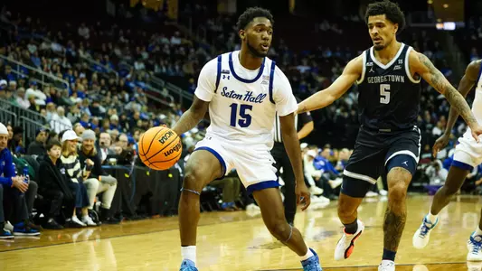 Jahseem Felton dribbles the ball against Georgetown