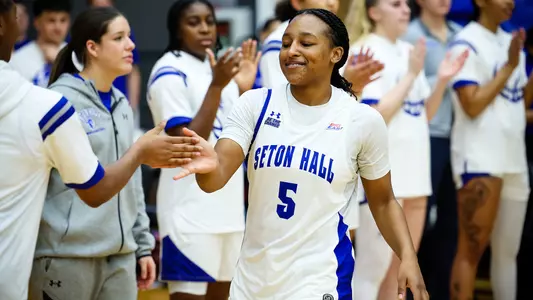 Savannah Catalon high-fives her teammates during pregame introductions prior to Seton Hall's game against Howard no Dec. 6