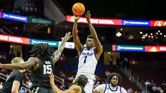Kadary Richmond takes a jumper against Xavier