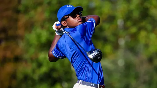 Isaiah Williams takes a swing during a practice round in the fall of 2022