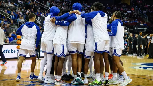 Seton Hall men's basketball huddles before the second half against Providence.