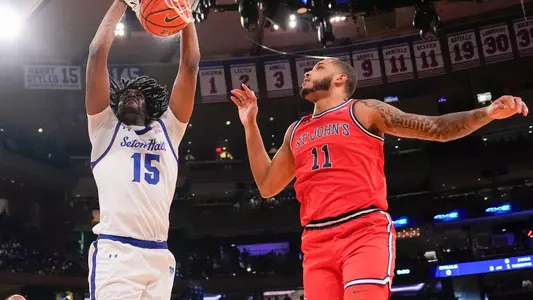 NEW YORK, NY - MARCH 14:  at Madison Square Garden on March, 14  2024 in New York City. (Photo by Porter Binks). Jaden Bediako dunks on Joel Soriano to start game vs. St. John's