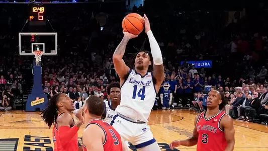 Mar 14, 2024; New York City, NY, USA; Seton Hall Pirates guard Dre Davis (14) shoots against the St. John's Red Storm during the first half at Madison Square Garden. Mandatory Credit: Robert Deutsch-USA TODAY Sports