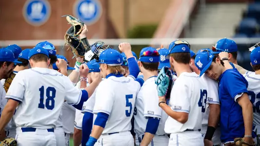 Baseball team huddles before game against Wagner