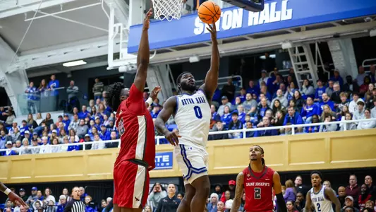 Dylan Addae-Wusu goes up for a layup against Saint Joseph's in the NIT.