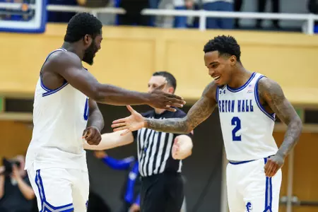 Al-Amir Dawes and Dylan Addae-Wusu High fiving