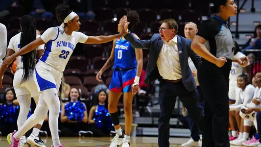 Brazil Harvey-Carr and Tony Bozzella high-five during Seton Hall's victory over DePaul on March 8