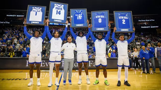 Seton Hall's 5 seniors, Kadary Richmond, Dre Davis, Jaden Bediako, Dylan Addae-Wusu and Al-Amir Dawes showcasing their framed jerseys with head coach Shaheen Holloway.