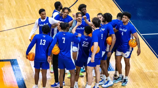 The Seton Hall men's basketball team huddles before practice at Hinkle Fieldhouse