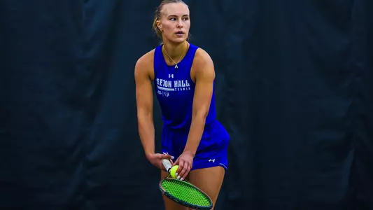 Aili Hietala serving vs. Marquette at NJIT